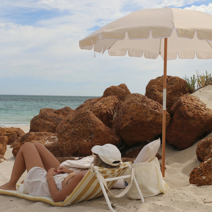 Sunnylife | Beach Umbrella - Mango Bay Golden Mustard Stripe | Shut the Front Door